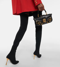 Balmain Moneta monogram mesh over-the-knee boots