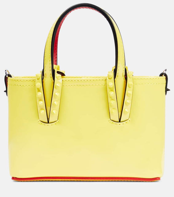 Christian Louboutin Cabata patent leather tote bag. Shop Christian Louboutin Tote Bags for women now.