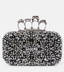 Alexander McQueen Knuckle embellished leather clutch. Shop Alexander McQueen Clutches for women now.