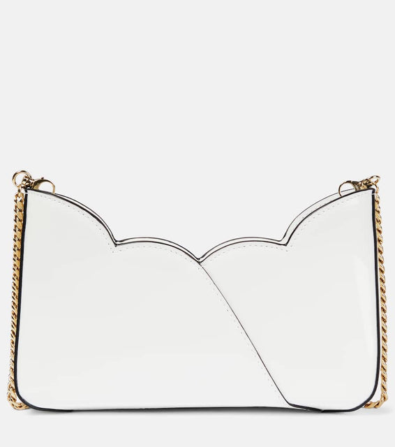 Christian Louboutin Hot Chick Small patent leather clutch. Shop Christian Louboutin Shoulder Bags for women now.