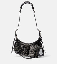 Balenciaga Le Cagole XS leather shoulder bag. Shop Balenciaga Shoulder Bags for women now.