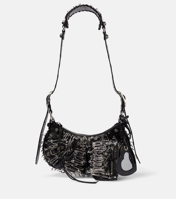 Balenciaga Le Cagole XS leather shoulder bag. Shop Balenciaga Shoulder Bags for women now.