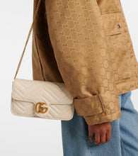 Gucci GG Marmont leather wallet on chain