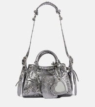 Balenciaga Neo Cagole XS leather tote bag. Shop Balenciaga Shoulder Bags for women now.