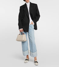 Tod's Tasseled boucl√É¬© and leather loafers