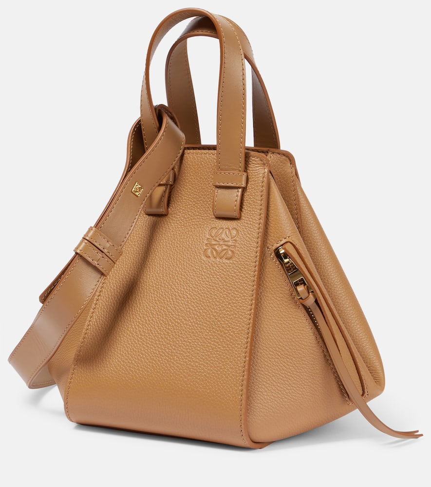 Loewe Hammock Compact leather tote bag. Shop Loewe Top-Handle Bags for women now.