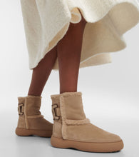 Tod's Suede and shearling ankle boots