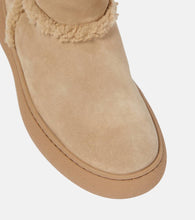 Tod's Suede and shearling ankle boots