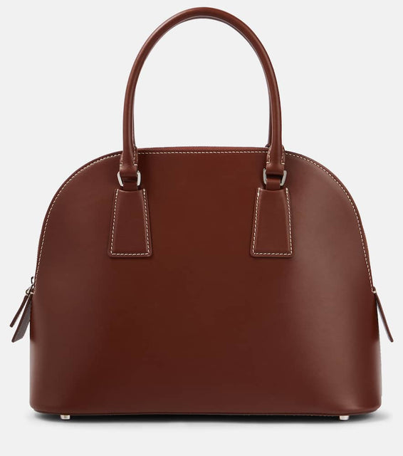 The Row Nina Small leather tote bag. Shop The Row Top-Handle Bags for women now.
