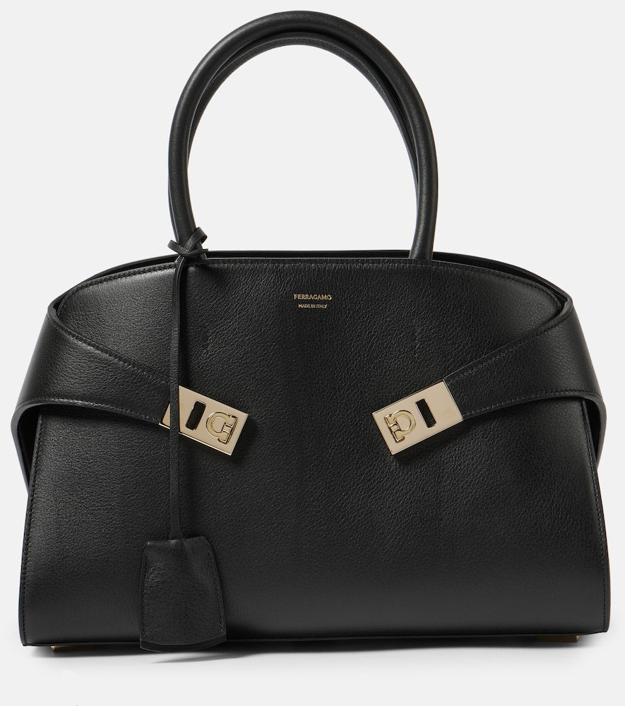 Ferragamo Hug Medium leather tote bag. Shop Ferragamo Top-Handle Bags for women now.