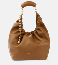Loewe Squeeze Medium leather shoulder bag. Shop Loewe Shoulder Bags for women now.