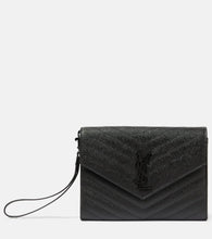 Saint Laurent Cassandre matelass√É¬© leather clutch. Shop Saint Laurent Clutches for women now.