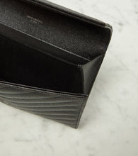 Saint Laurent Cassandre matelass√É¬© leather clutch
