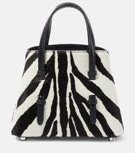Alaia Mina 16 micro calf hair tote bag. Shop Alaia Top-Handle Bags for women now.