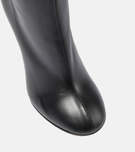 Alaia Leather knee-high boots