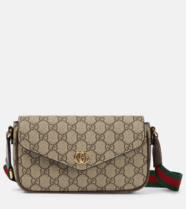 Gucci Ophidia GG Canvas Mini crossbody bag. Shop Gucci Shoulder Bags for women now.