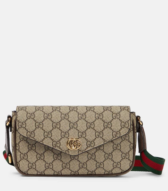 Gucci Ophidia GG Canvas Mini crossbody bag. Shop Gucci Shoulder Bags for women now.