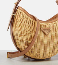 Prada Arqu√É¬© woven leather-trimmed shoulder bag