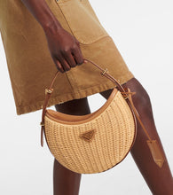 Prada Arqu√É¬© woven leather-trimmed shoulder bag