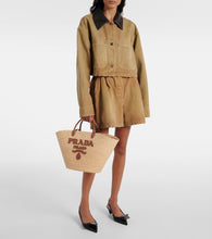 Prada Logo leather-trimmed raffia basket bag