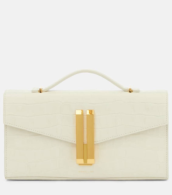 DeMellier Vancouver croc-effect leather clutch. Shop DeMellier Shoulder Bags for women now.