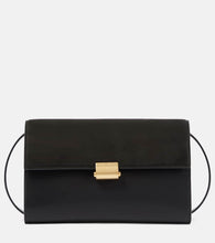 The Row Laurie suede and leather crossbody bag. Shop The Row Shoulder Bags for women now.