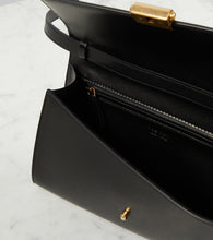 The Row Laurie suede and leather crossbody bag