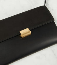 The Row Laurie suede and leather crossbody bag