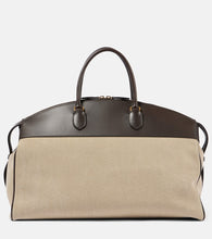 The Row George XL leather-trimmed denim duffel bag. Shop The Row Tote Bags for women now.