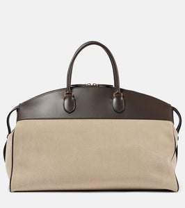 The Row George XL leather-trimmed denim duffel bag. Shop The Row Tote Bags for women now.