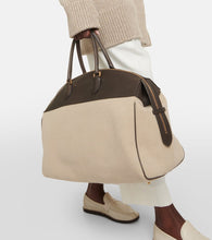 The Row George XL leather-trimmed denim duffel bag