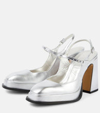 Souliers Martinez Claudia metallic leather platform pumps