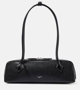 Alaia Le Teckel leather shoulder bag. Shop Alaia Shoulder Bags for women now.