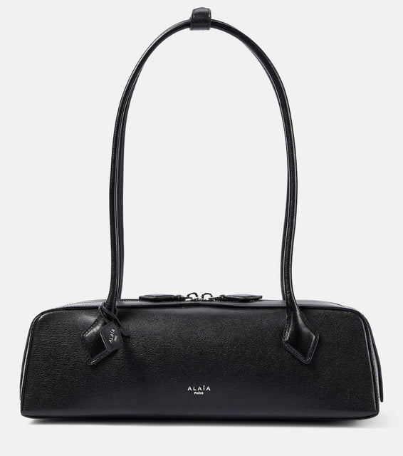 Alaia Le Teckel leather shoulder bag. Shop Alaia Shoulder Bags for women now.