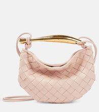Bottega Veneta Sardine Intrecciato Baby leather crossbody bag. Shop Bottega Veneta Shoulder Bags for women now.