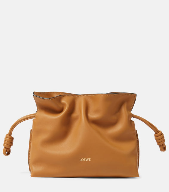 Loewe Flamenco Mini leather clutch. Shop Loewe Clutches for women now.