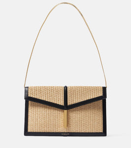 DeMellier Tokyo leather-trimmed raffia clutch. Shop DeMellier Clutches for women now.