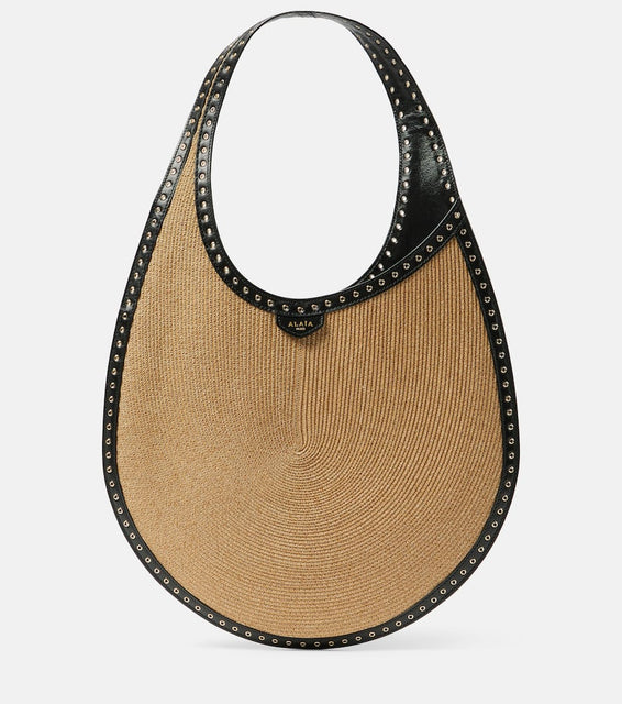 Alaia One Piece Medium paper straw shoulder bag. Shop Alaia Shoulder Bags for women now.