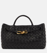 Bottega Veneta East-West Andiamo Intrecciato leather tote bag. Shop Bottega Veneta Top-Handle Bags for women now.