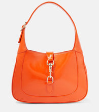 Gucci Gucci Jackie Small patent leather shoulder bag. Shop Gucci Shoulder Bags for women now.