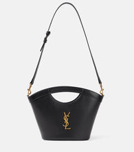 Saint Laurent Celia Mini leather tote bag. Shop Saint Laurent Top-Handle Bags for women now.