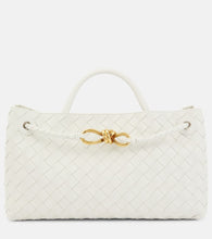 Bottega Veneta East-West Andiamo Intrecciato leather tote bag. Shop Bottega Veneta Top-Handle Bags for women now.