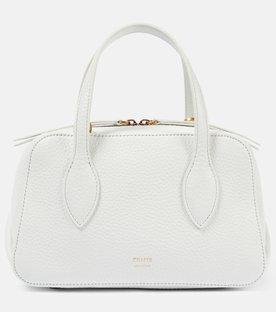 Khaite Maeve Small leather tote bag. Shop Khaite Top-Handle Bags for women now.