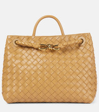 Bottega Veneta Andiamo Intrecciato Medium leather tote bag. Shop Bottega Veneta Top-Handle Bags for women now.