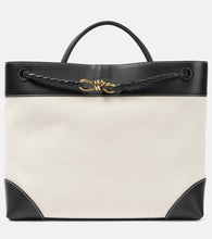 Bottega Veneta Andiamo Large leather-trimmed canvas tote bag. Shop Bottega Veneta Tote Bags for women now.