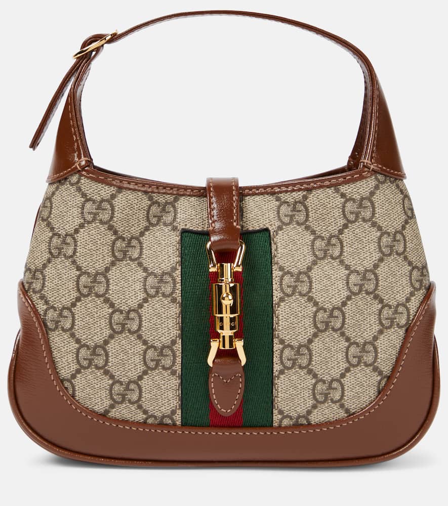 Gucci Gucci Jackie 1961 canvas shoulder bag. Shop Gucci Shoulder Bags for women now.