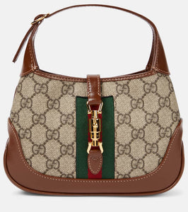 Gucci Gucci Jackie 1961 canvas shoulder bag. Shop Gucci Shoulder Bags for women now.
