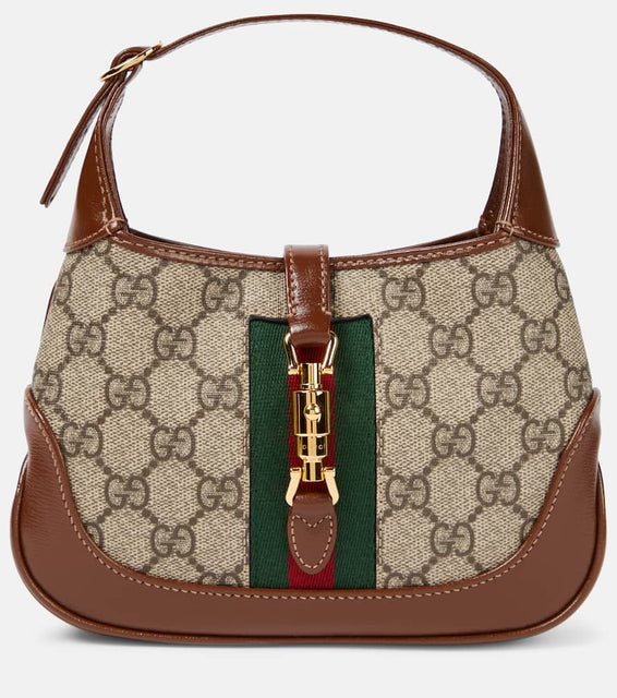 Gucci Gucci Jackie 1961 canvas shoulder bag. Shop Gucci Shoulder Bags for women now.