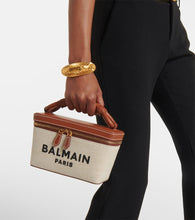 Balmain B-Army leather-trimmed canvas makeup bag