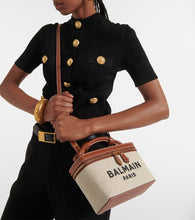 Balmain B-Army leather-trimmed canvas makeup bag